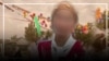 38-летняя жительница Ошской области на вечере выпускников, которую позже застрелил муж. Лицо скрыто по этическим соображениям 