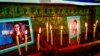 A memorial pays tribute to Yama Siyawash, a former news presenter at Tolo News, and Mohammad Ilyas Dayee, a journalist for Radio Free Afghanistan. The two were killed in magnetic bomb blasts in Helmand and Kabul, respectively, in November.
