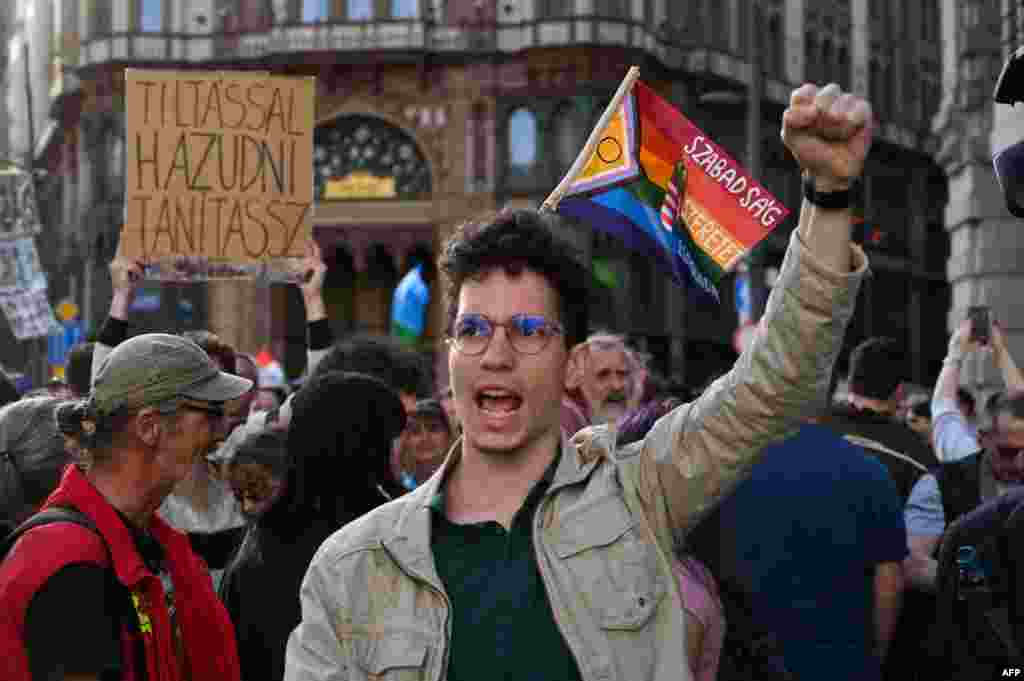 A Hungarian protester shouts an anti-government slogan during a demonstration close to the Erzsebet Bridge in central Budapest.