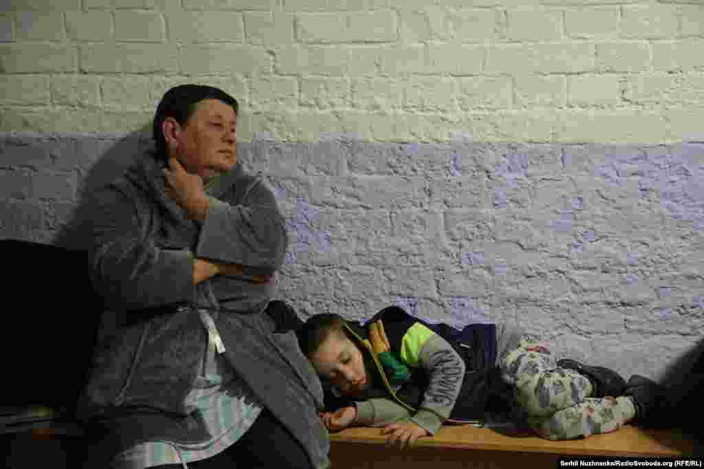 Residents wait in a bomb shelter in Kyiv during a Russian attack.