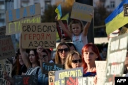 Relatives and friends of Ukrainian prisoners of war from the Azov Brigade and sub-units takes part the a rally in Kyiv on September 8, 2024, calling for their exchange with Russian prisoners.
