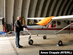 Tomas Nosek with his light aircraft.