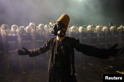 A protester gesticulates during a demonstration in Istanbul on March 23 after the city's mayor, Ekrem Imamoglu, was arrested and jailed.